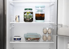 Load image into Gallery viewer, WhiteRhino Glass Pickle Jar with Strainer Flip,34oz/1000ml Olive Hourglass Container,Upside Down Pickle Storage Holder for Jalapenos,Leakproof Airtight Lids and Refrigerator Dishwasher Safe(Clear)