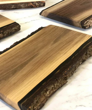 Load image into Gallery viewer, Live-edge wooden serving board available as an upgrade for the Vegan Grazing Box.